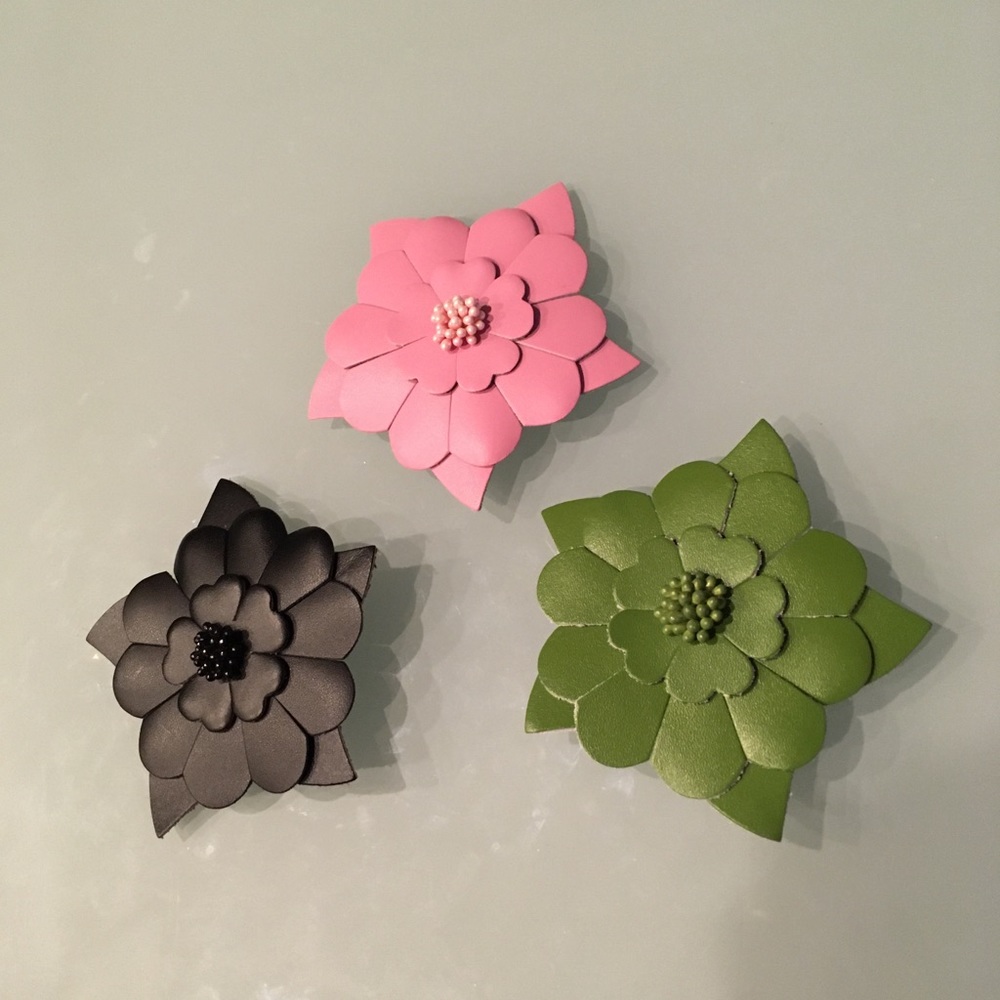 Three flower pins
